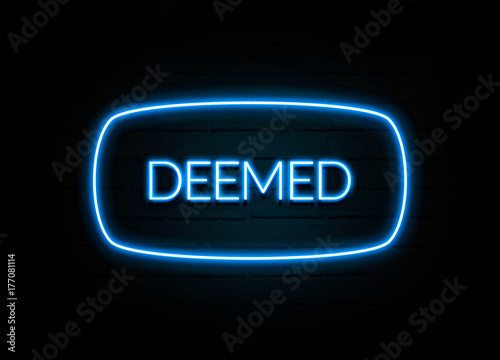 Deemed - colorful Neon Sign on brickwall