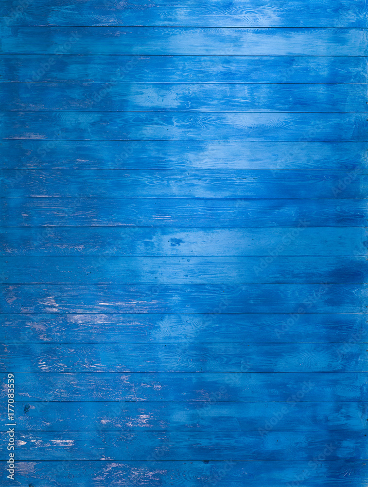 Obraz premium Blue Barn.Fresh blue paint on a wooden surface,rustic turquoise background.Abstract Web Banner.