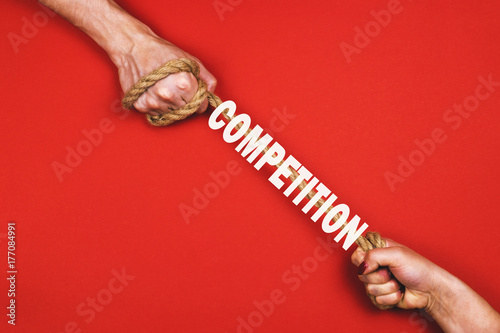 A man and a woman pull the rope. The concept of competition and the right to vote.