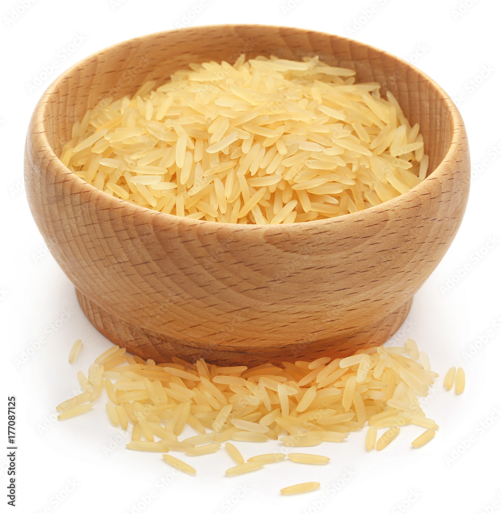 Basmati rice in a bowl over white background