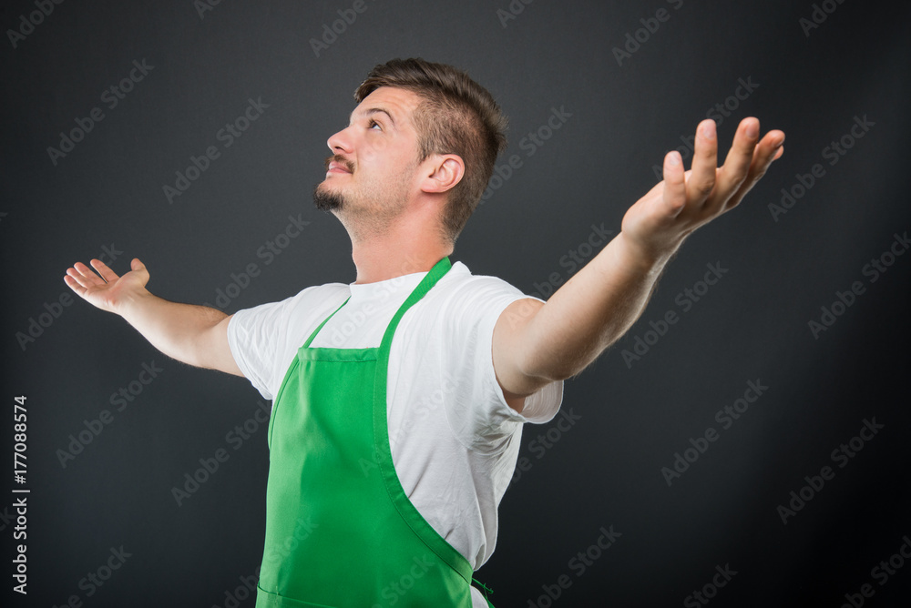 Portrait supermarket employer holding hands wide open Portrait supermarket employer holding hands wide open