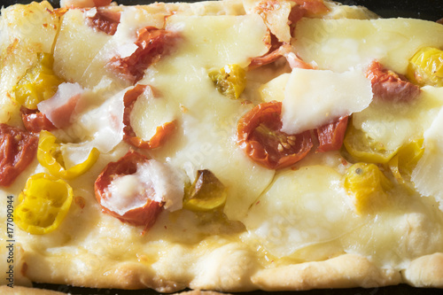 pizza with cherry and vesuviani tomatoes photo