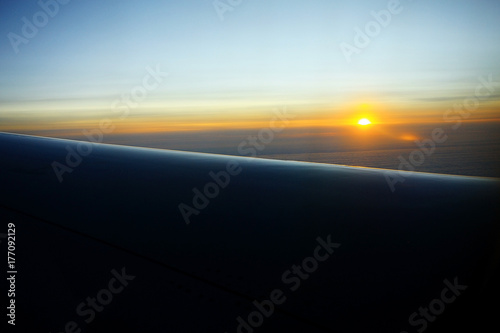 sunset clouds view from the airplane