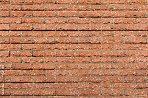 Horizontal front view of red brick wall