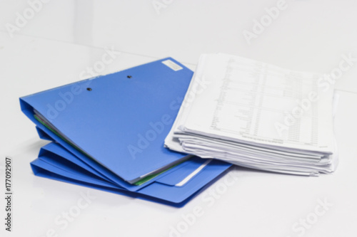 file folder and Stack of business report paper file on table.