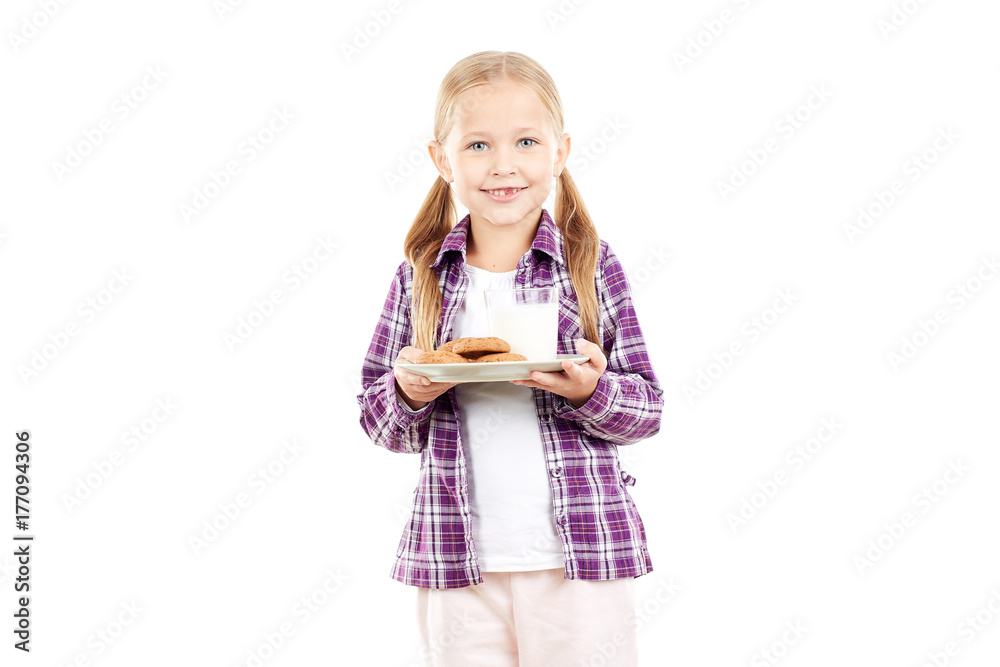 Portrait of little girl holding plate with cookies Portrait of little girl holding plate with cookies