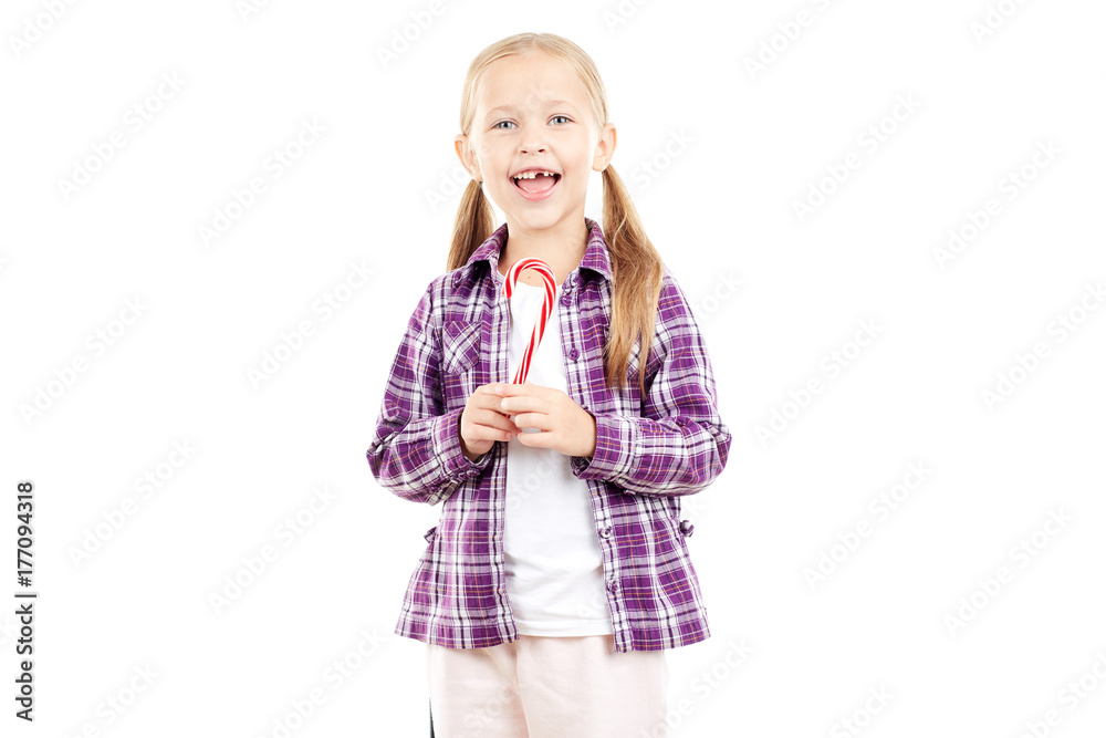 Portrait of cute little girl holding candy cane Portrait of cute little girl holding candy cane