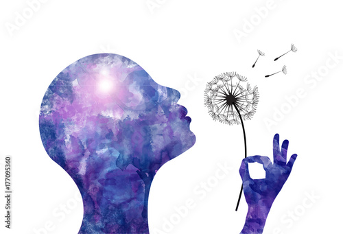woman blowing a dandelion