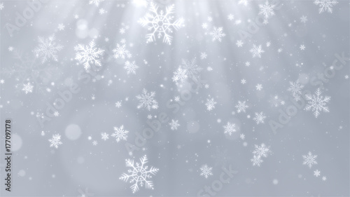 Christmas background (white theme) with snowflakes, shiny lights and particles bokeh in stylish and elegant theme.