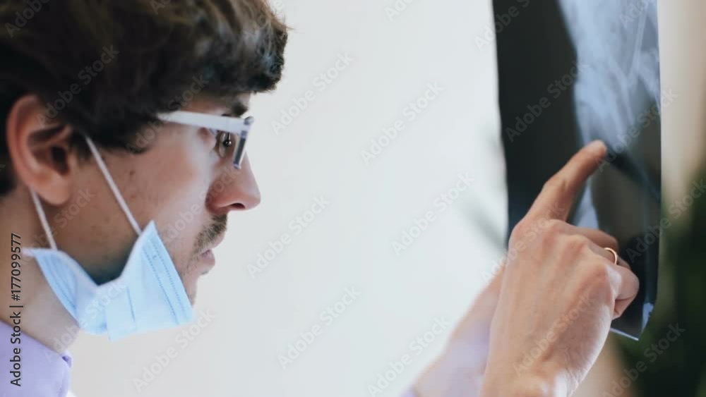 Doctor looking x-ray of the human body Doctor looking x-ray of the human body