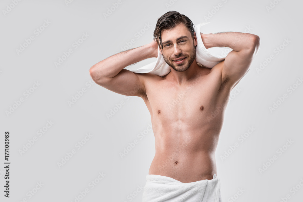 shirtless man with wet hair