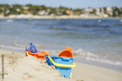 Toys on the beach near a sea