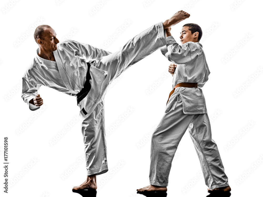 two karate men sensei and teenager student fighters fighting isolated on white background two karate men sensei and teenager student fighters fighting isolated on white background