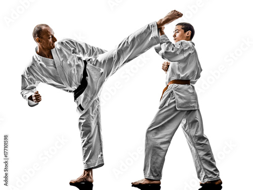 two karate men sensei and teenager student fighters fighting isolated on white background