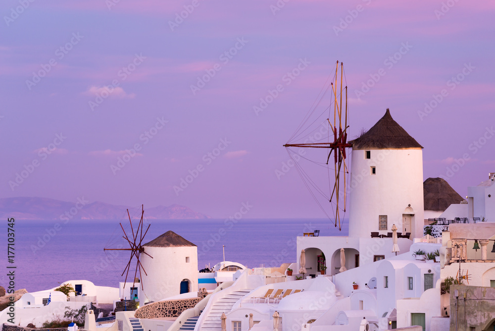 Fototapeta premium Oia village at the Santorini Island at sunset