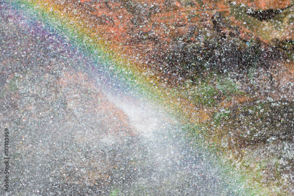 Beautiful abstract background, rainbow on splashing water Beautiful abstract background, rainbow on splashing water