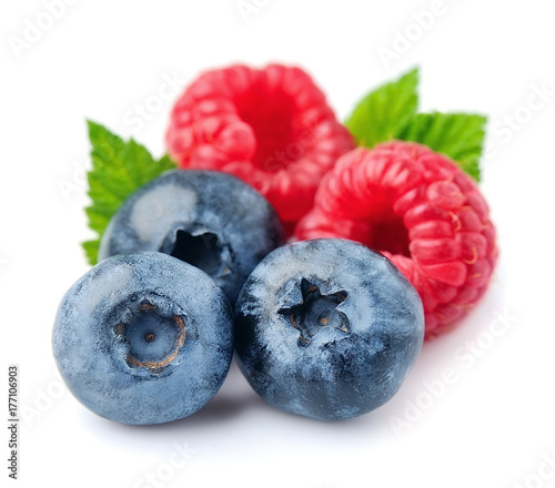 Ripe raspberry and blueberries.