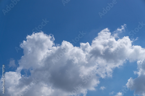 details of white clouds on blue sky, background of beautiful sky on sunny day