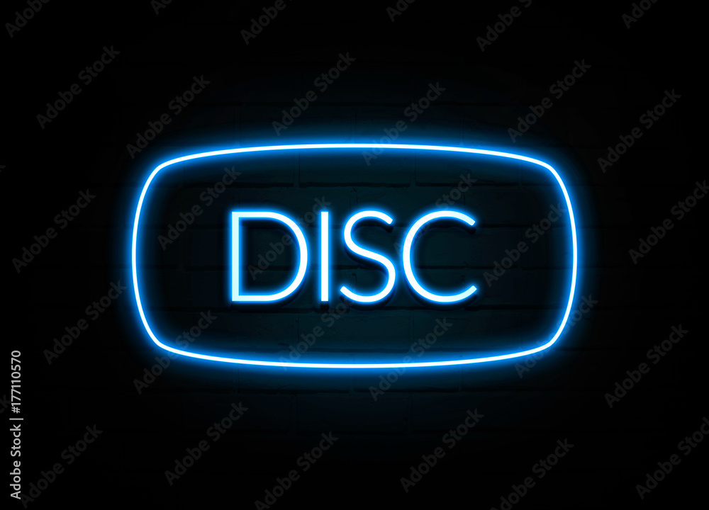 Disc - colorful Neon Sign on brickwall Disc - colorful Neon Sign on brickwall