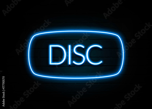 Disc - colorful Neon Sign on brickwall