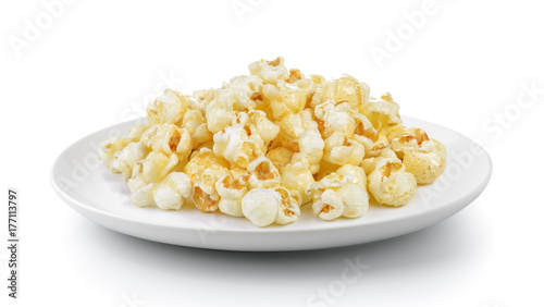 Popcorn in a plate isolated on a white background