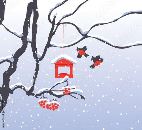 Vector winter landscape with snow-covered branches and red bunches of a Rowan tree, bullfinches and a bird feeder in the snow in flat style
