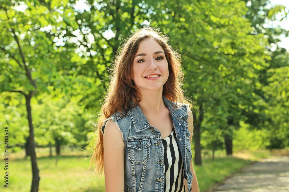 Portrait of young woman in the park Portrait of young woman in the park