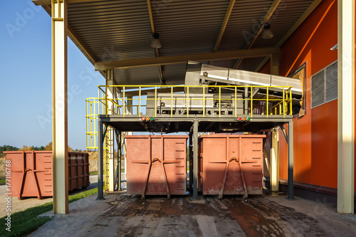 Plastic bales at the waste processing plant. Separate garbage collection. Recycling and storage of waste for further disposal. Business for sorting and processing of waste. photo