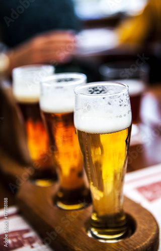 Glass of beers on wooden table