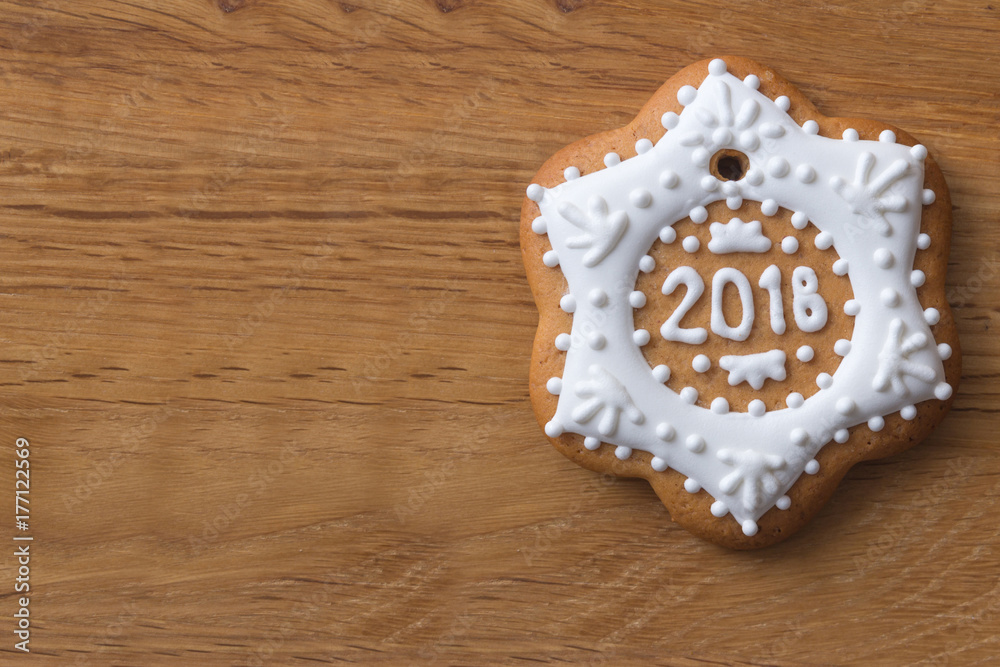 Baked delicious gingerbread with a painted white icing form of the star and snowflake. Baked delicious gingerbread with a painted white icing form of the star and snowflake.