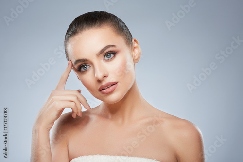 Beautiful girl with nude make up at studio