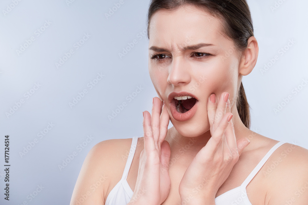 Woman suffering from toothache
