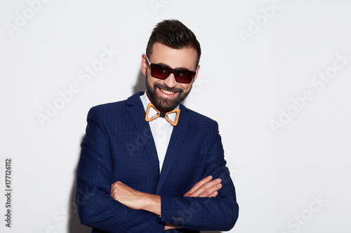 Portrait of handsome man at white background