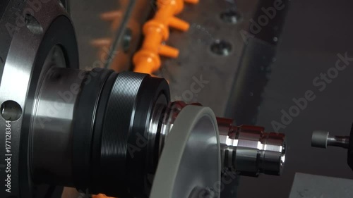 4K video footage of high precision hard turning grinding CNC machine. Metal processing equipment