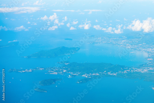 Aerial view of the tropical islands in blue sea water © Iryna Rasko