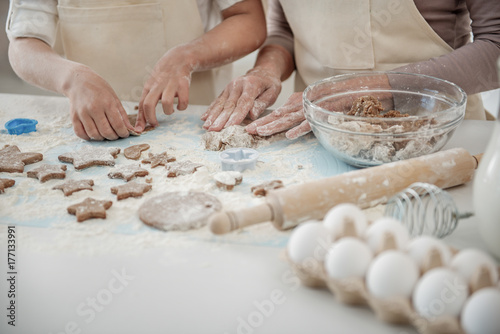 Cheerful family preparing sweet pastry