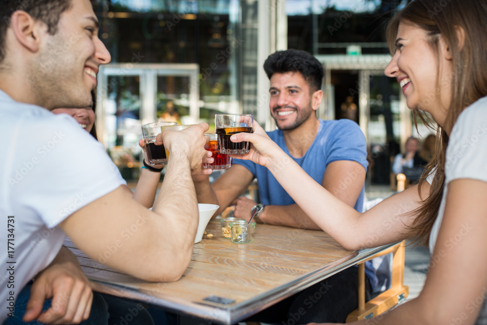 Group of friends having a drink