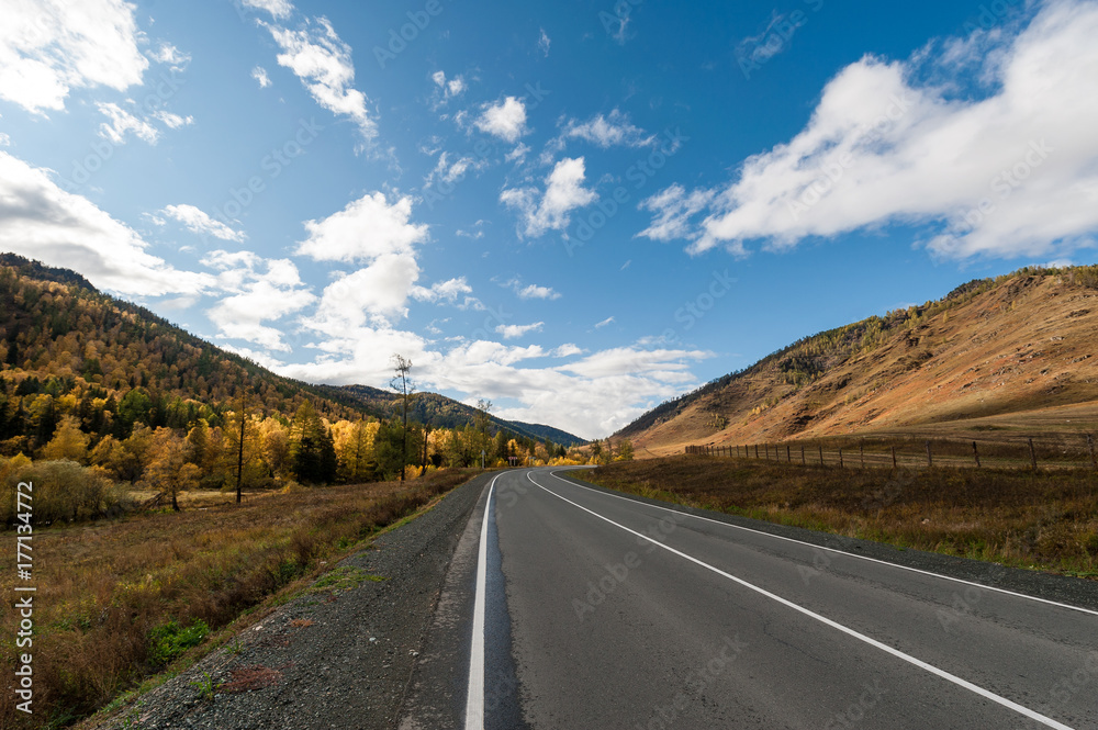 the road along the path among the mountain terrain with magnificent views