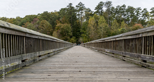 Wooden Bridge with fall color © Melvin