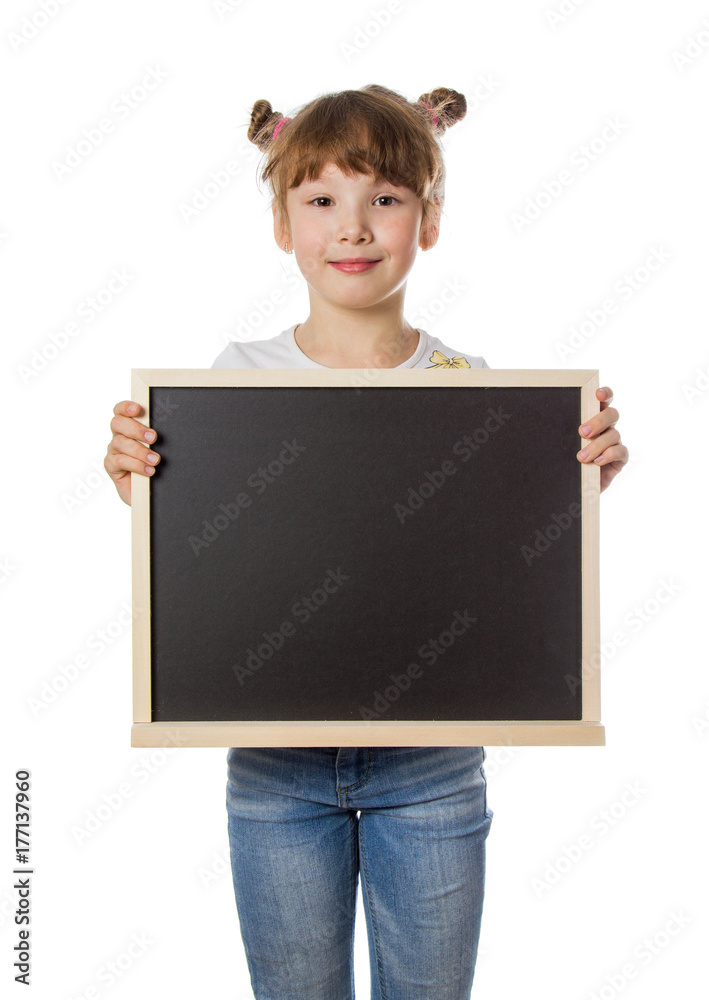 A young girl with blond hair is holding a drawing board in her hands. white isolated background. A young girl with blond hair is holding a drawing board in her hands. white isolated background.