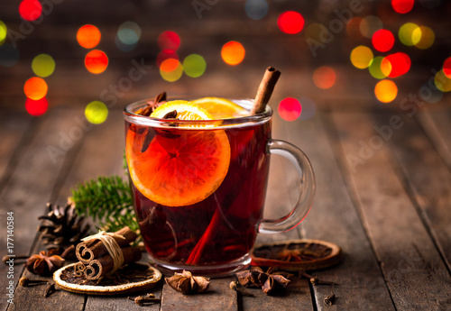Hot mulled wine with cinnamon and star anise photo