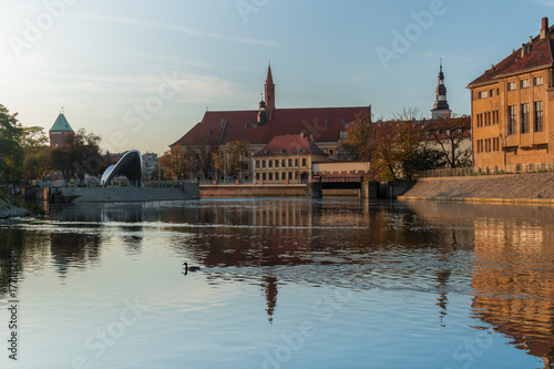 Tamka Island with reflections in the Odra river at dawn, Wroclaw, Poland
