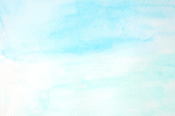 Blue and green abstract watercolor painting textured on white paper background