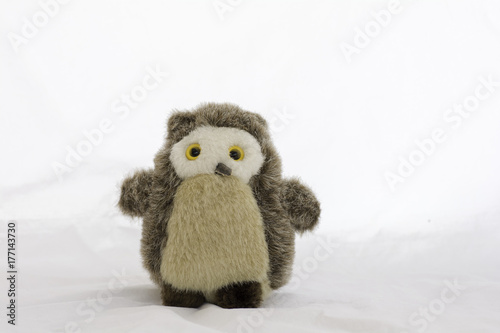 Stuffed animal owl toy on a white background
