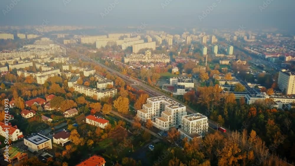 Beautiful cinematic aerial shot of misty sunrise in foggy town in autumn Beautiful cinematic aerial shot of misty sunrise in foggy town in autumn