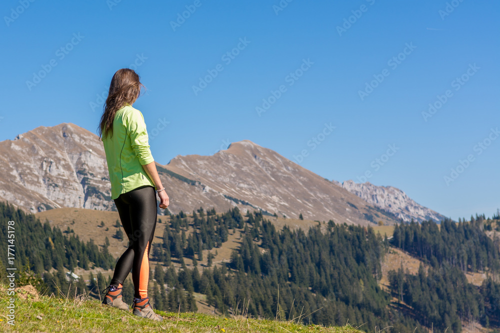 Female hiker planing her next hike.