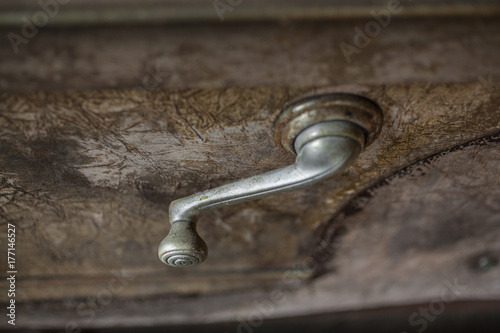 Window crank in an old abandoned car