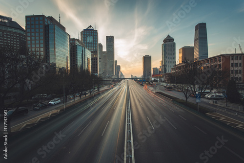 Road in Beijing Central Business District at sunset, China photo