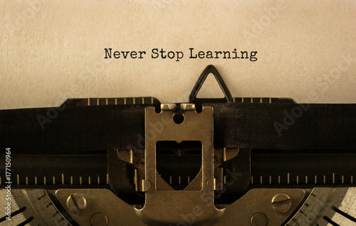 Text Never Stop Learning typed on retro typewriter photo