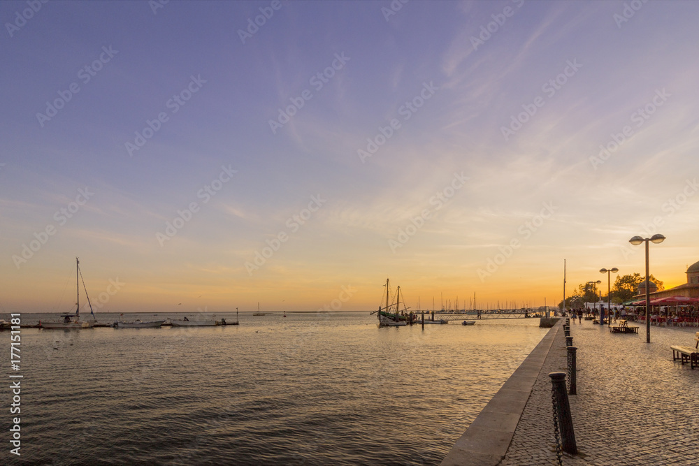 Olhao city market waterfront view to Ria Formosa sunset, Algarve.